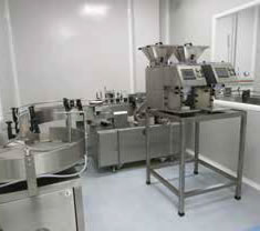 Mesin pembilang dan pelabelan tablet separa automatik